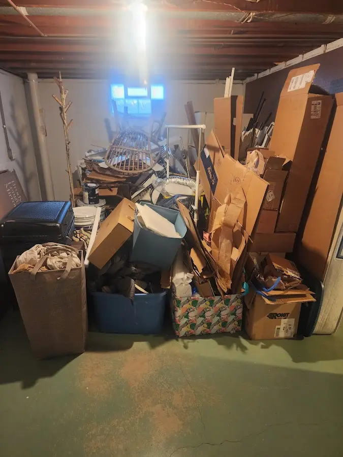 Roll-off dumpster container at job site for 4 Yard Dumpster Rental in Medway